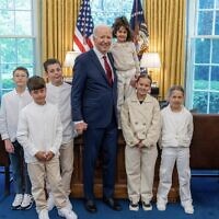 US President Joe Biden holds freed Hamas hostage Avigail Idan while standing with other members of her family, at the White House, Washington, DC, April 24, 2024. (White House photo)