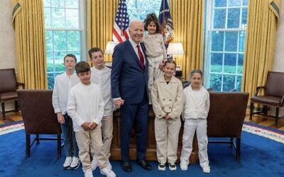 US President Joe Biden holds freed Hamas hostage Avigail Idan while standing with other members of her family, at the White House, Washington, DC, April 24, 2024. (White House photo)