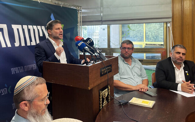 Finance Minister Bezalel Smotrich addresses the media following a meeting of his Religious Zionism faction in the Knesset, April 30, 2024. (Sam Sokol/Times of Israel)