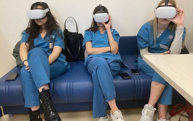 Medical students at Baruch Padeh (Poriya) Medical Center in Tiberias try OtheReality VR sets. (Courtesy)