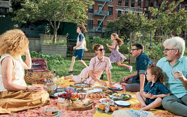 Naama Shefi, founder of the Jewish Food Society and Asif: Culinary Institute of Israel, enjoys a Shabbat picnic with friends and family, also included as a chapter in 'The Jewish Holiday Table' cookbook, by Shefi with Devra Ferst (Courtesy Penny De Los Santos)