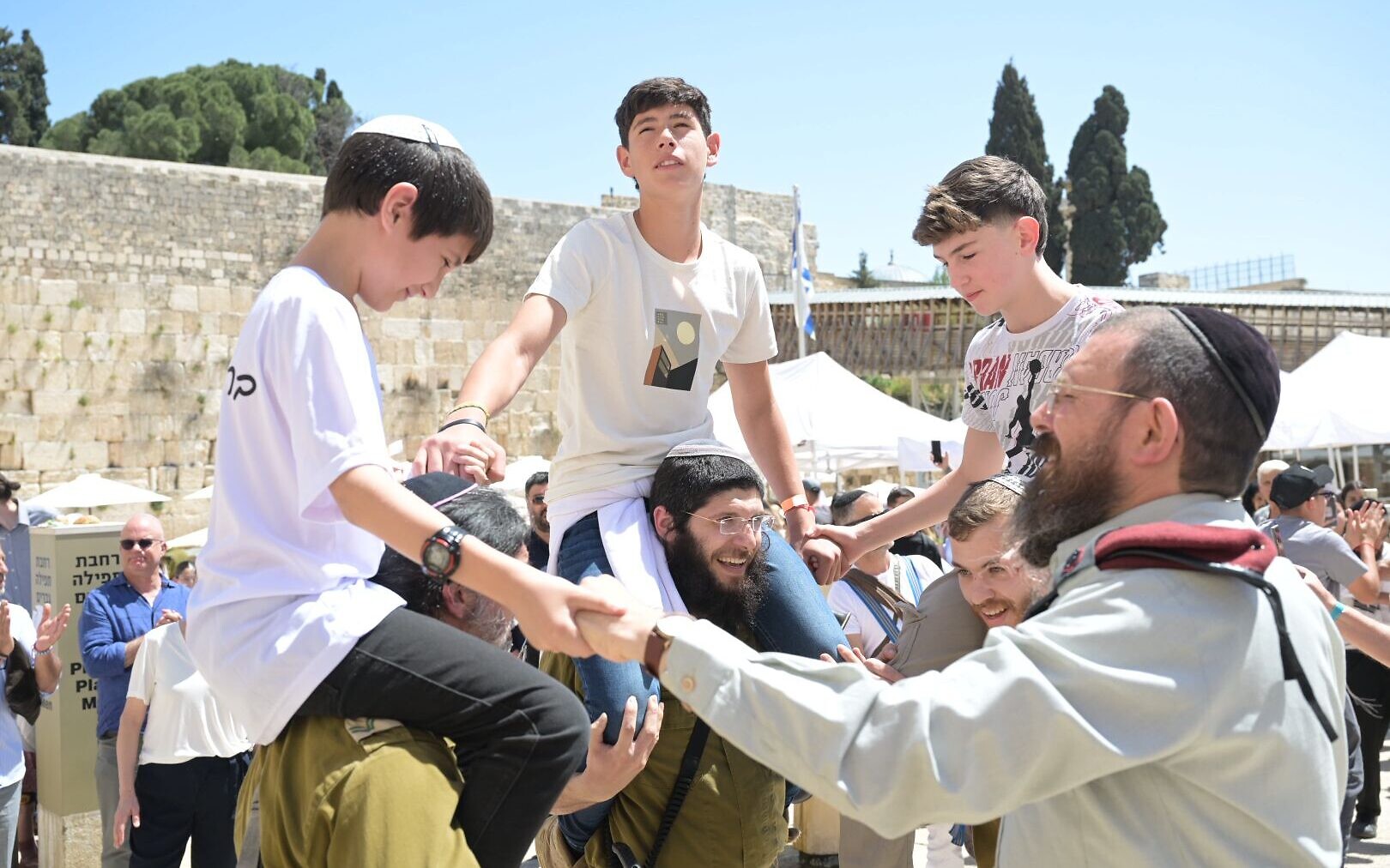 Through pain of loss, IDF orphans celebrate bar and bat mitzvahs at Western Wall