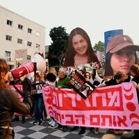 Large images of hostages Naama Levy and Liri Albag are held above the crowd as protesters in Tel Aviv call for a hostage deal, April 11, 2024. (Danor Aharon/ Pro-Democracy Protest Movement)