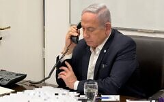Prime Minister Benjamin Netanyahu calls US President Joe Biden from IDF's Kirya military headquarters in Tel Aviv on April 14, 2024. (GPO)