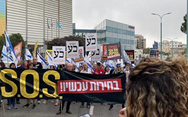 In an image released by anti-government activists, protesters demand 'elections now' in at a march in Haifa, on April 27, 2024. (Eilat Markovitch)