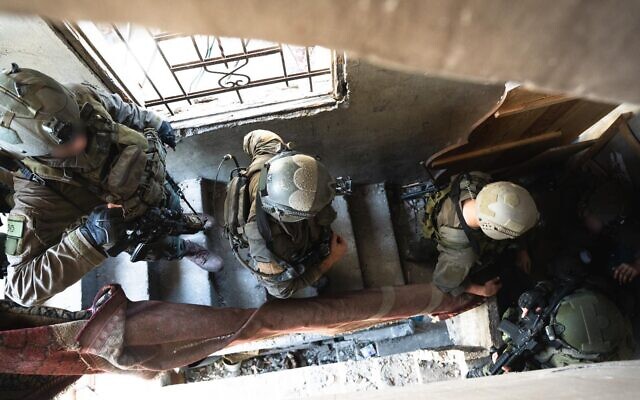 IDF troops in Gaza, in a photograph issued by the IDF on April 5, 2024 (IDF Spokesman's Office)