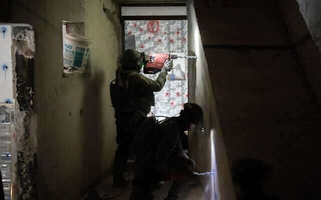IDF troops demolish the home of a Palestinian terrorist in the West Bank town of Bani Naim, early April 17, 2024. (Israel Defense Forces)