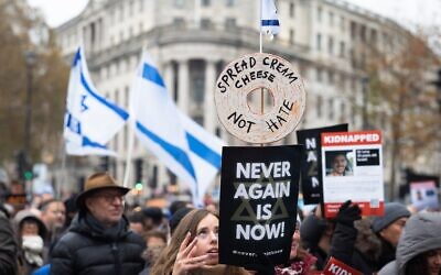 People participate in a "March Against Antisemitism" in London on November 26, 2023. (Andy Solomon / Shutterstock)