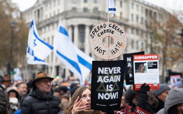People participate in a "March Against Antisemitism" in London on November 26, 2023. (Andy Solomon / Shutterstock)
