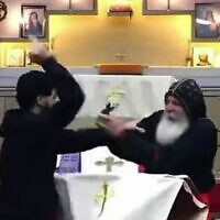 Still image from a livestreamed sermon shows an assailant approaching Bishop Mar Mari Emmanuel to stab him at the Assyrian Orthodox Christ the Good Shepherd Church in Sydney, Australia, April 15, 2024. (Screenshot/Christ The Good Shepherd Church, used in accordance with Clause 27a of the Copyright Law)