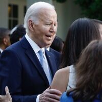 US President Joe Biden greets guests after speaking at a reception celebrating Jewish American Heritage Month in the Rose Garden of the White House, May 20, 2024. (Anna Moneymaker/Getty Images via JTA)