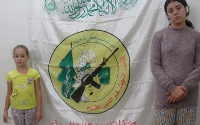 Ela (L) and Dafna Elyakim are seen in a photo released by the IDF on May 19, 2024, which was taken while the two sisters were held captive by Hamas terrorists in the Gaza Strip last year. (Israel Defense Forces)
