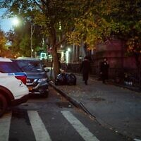 Illustrative: NYPD vehicles in a religious neighborhood in Brooklyn, November 6, 2022. (Luke Tress)