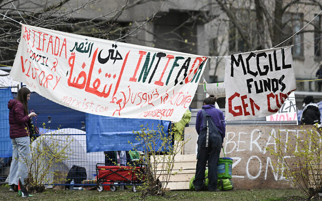 Pro-Palestinian students and activists protest at an anti-Israel encampment on the campus at McGill University in Montreal, Canada, on April 29, 2024. (Graham Hughes/AFP)