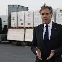 US Secretary of State Antony Blinken speaks to the press in front of a truck with humanitarian aid bound for Gaza, at the Jordanian Hashemite Charity Organization in Amman on April 30, 2024. (Evelyn Hockstein/Pool/AFP)