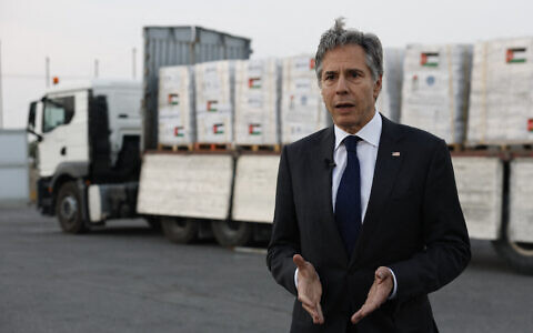 US Secretary of State Antony Blinken speaks to the press in front of a truck with humanitarian aid bound for Gaza, at the Jordanian Hashemite Charity Organization in Amman on April 30, 2024. (Evelyn Hockstein/Pool/AFP)