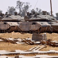 Israeli troops are seen near the border with the Gaza Strip in southern Israel on May 1, 2024. (JACK GUEZ / AFP)