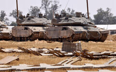 Israeli troops are seen near the border with the Gaza Strip in southern Israel on May 1, 2024. (JACK GUEZ / AFP)