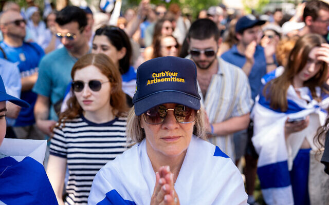 A woman wears a hat that reads 'Curb Your Antisemitism' during a rally against campus antisemitism at George Washington University on May 2, 2024 in Washington, DC. (Andrew Harnik/Getty Images/AFP)