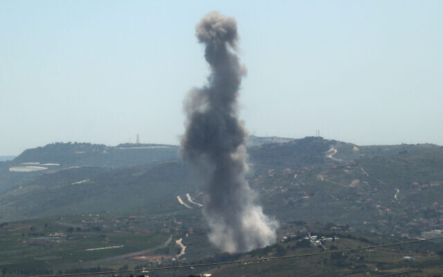 Smoke billows from the site of an Israeli airstrike on the southern Lebanese village of Kfarkila near the border on May 8, 2024. (Rabih DAHER / AFP)