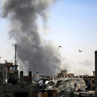 Smoke billows from Israeli strikes in Rafah in the southern Gaza Strip on May 9, 2024. (AFP)