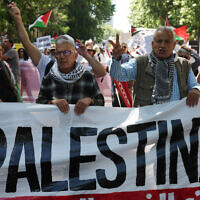 People take part in a demonstration in support of the Palestinian people in Madrid, Spain, on May 11, 2024. (Pierre-Philippe MARCOU / AFP)