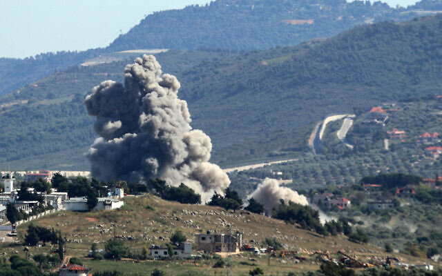 A smoke plume rises over athe southern Lebanese village of Kfar Kila during Israeli bombardment on May 16, 2024. (Rabih Daher/AFP)