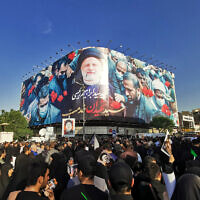 Mourners attend the funeral of Iranian president Ebrahim Raisi, in Tehran, on May 22, 2024. (Atta KENARE / AFP)