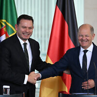 German Chancellor Olaf Scholz (R) and Portuguese Prime Minister Luis Montenegro shake hands at the end of a joint press conference after talks at the Chancellery in Berlin, Germany, May 24, 2024. (Ralf Hirschberger / AFP)