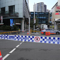 Illustrative: Australian police block a street near a crime scene at Bondi Junction in Sydney, April 14, 2024. (Rick Rycroft/AP)