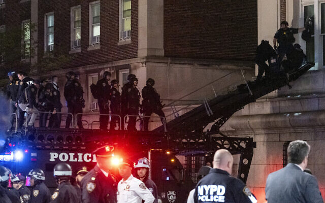 Using a tactical vehicle, New York City police enter an upper floor of Hamilton Hall on the Columbia University campus in New York, April 30, 2024, after a building was taken over by anti-Israel, pro-Palestinian protesters earlier in the day. (AP Photo/Craig Ruttle)