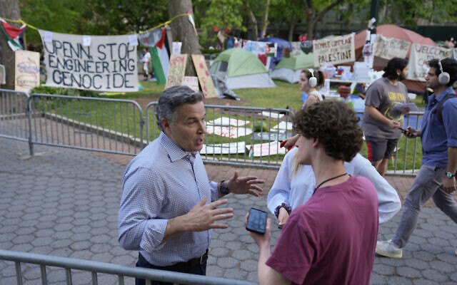 Republican US Senate candidate Dave McCormick speaks outside an anti-Israel encampment at the University of Pennsylvania in Philadelphia, May 1, 2024. (AP Photo/Matt Rourke)