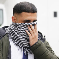 West Yorkshire Police officer Mohammed Adil, 26, charged with terror offenses for sharing posts in support of Hamas, leaves Westminster Magistrates' Court in central London, May 2, 2024. (Victoria Jones/PA via AP)
