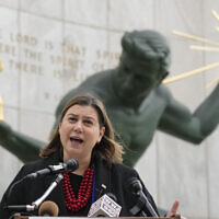 Rep. Elissa Slotkin speaks to reporters March 2, 2023, in Detroit, about her candidacy for the US Senate in 2024. (AP Photo/Carlos Osorio, File)