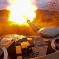 FILE - In this photo released by the Russian Defense Ministry on March 19, 2024, a Russian tank fires at Ukrainian troops from a position near the border with Ukraine in Russia’s Belgorod region. (Russian Defense Ministry Press Service via AP, File)
