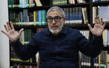 File - University of Glasgow rector Dr. Ghassan Abu Sitta, a Palestinian-British surgeon specializing in conflict medicine, speaks during an interview at the Institute for Palestine Studies in Beirut, Lebanon, December 9, 2023. (AP Photo/Hussein Malla, File)