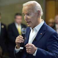 US President Joe Biden meets with campaign volunteers at the Dr. John Bryant Community Center, May 8, 2024, in Racine, Wisconsin. (AP Photo/Evan Vucci)