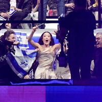 Israel's Eden Golan (center) celebrates advancing to the final during the second semifinal at the Eurovision Song Contest in Malmo, Sweden, May 9, 2024. (AP Photo/Martin Meissner)