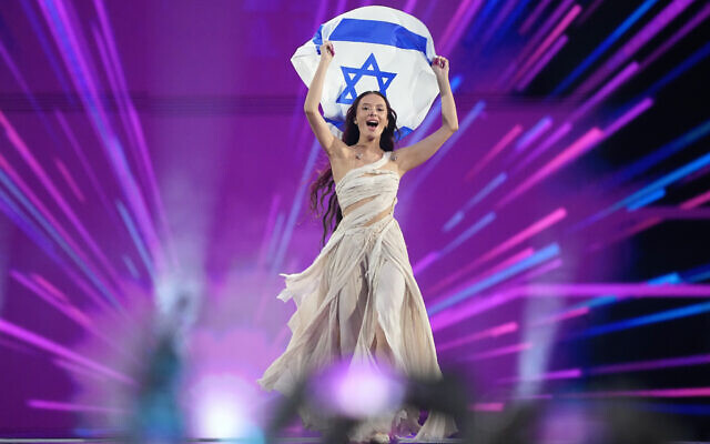 Eden Golan of Israel enters the arena during the flag parade before the Grand Final of the Eurovision Song Contest in Malmo, Sweden, May 11, 2024. (AP Photo/Martin Meissner)