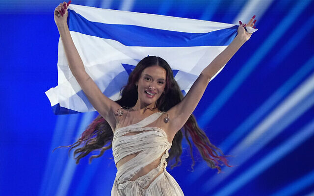 Eden Golan of Israel enters the arena during the flag parade before the Grand Final of the Eurovision Song Contest in Malmo, Sweden, May 11, 2024. (AP Photo/Martin Meissner)