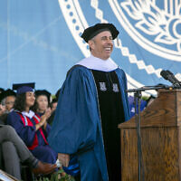 Commencement speaker Jerry Seinfeld laughs on stage during Duke University's graduation ceremony, May 12, 2024, in Durham, North Carolina. (Bill Snead/Duke University via AP)