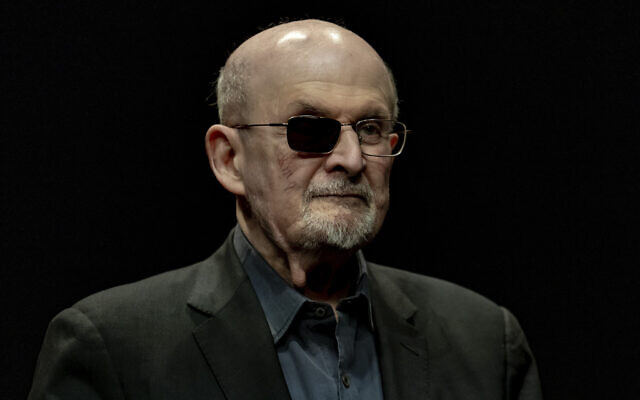 Salman Rushdie poses for a portrait to promote his book 'Knife: Meditations After an Attempted Murder,' at the Deutsches Theater in Berlin, Germany, May 16, 2024. (AP Photo/Ebrahim Noroozi)