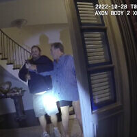 File: In this image taken from San Francisco Police Department body-camera video, the husband of former US House Speaker Nancy Pelosi, Paul Pelosi, right, fights for control of a hammer with his assailant David DePape during a brutal attack in the couple's San Francisco home, on Oct. 28, 2022 (San Francisco Police Department via AP, File)