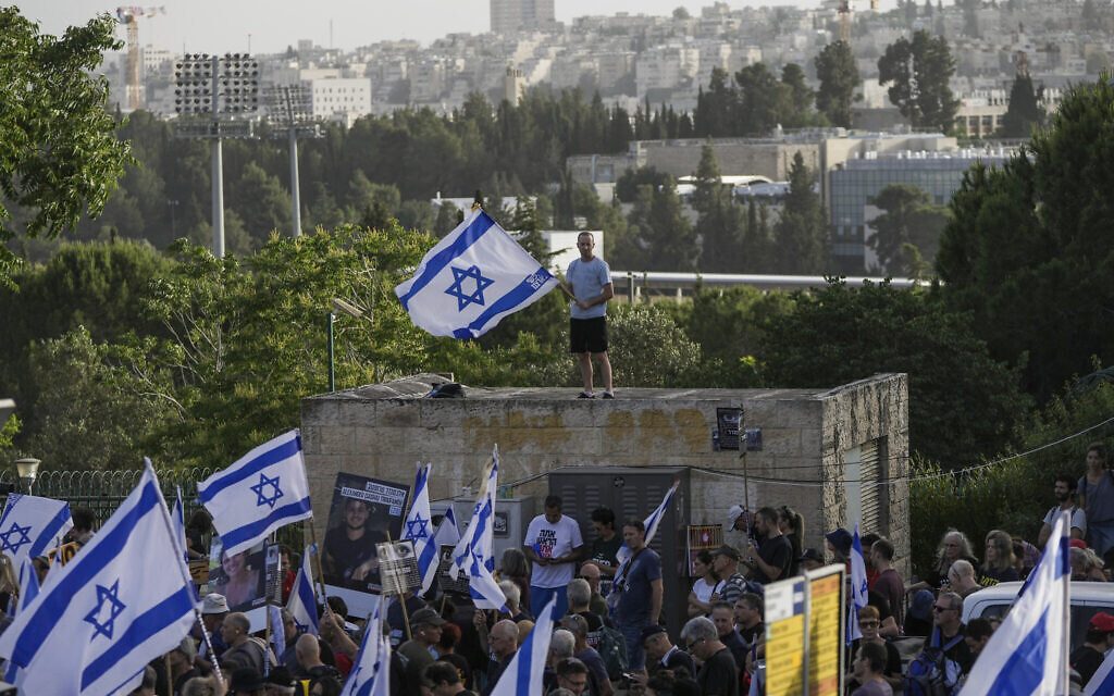 People protest against Prime Minister Benjamin Netanyahu's government and call for the release of hostages held in the Gaza Strip by Hamas, outside the Knesset, Jerusalem, May 20, 2024. (AP Photo/Mahmoud Illean)