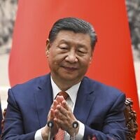 Chinese President Xi Jinping applauds during a signing ceremony at the Great Hall of the People in Beijing, China, May 16, 2024. (Sergei Guneyev, Sputnik, Kremlin Pool Photo via AP)
