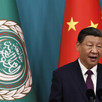 Chinese President Xi Jinping delivers a speech at the opening ceremony of the 10th ministerial meeting of the China-Arab States Cooperation Forum at the Diaoyutai State Guesthouse in Beijing Thursday, May 30, 2024. (Tingshu Wang/Pool Photo via AP)