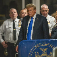 Former US president Donald Trump walks outside of a Manhattan courtroom after a jury convicted him of felony crimes for falsifying business records in a scheme to illegally influence the 2016 election, May 30, 2024, in New York. (Steven Hirsch/New York Post via AP, Pool)
