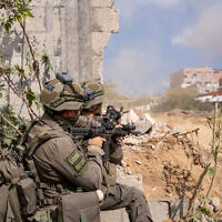 IDF troops are seen operating in northern Gaza's Jabaliya, May 14, 2024 (Emanuel Fabian/Times of Israel)