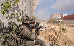 IDF troops are seen operating in northern Gaza's Jabaliya, May 14, 2024 (Emanuel Fabian/Times of Israel)