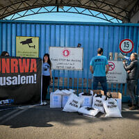 Israelis protest against UNRWA outside its offices in Jerusalem, March 13, 2024. (Arie Leib Abrams/Flash90)